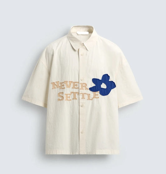 Cream Statement Shirt – Never Settle Embroidered Detail
