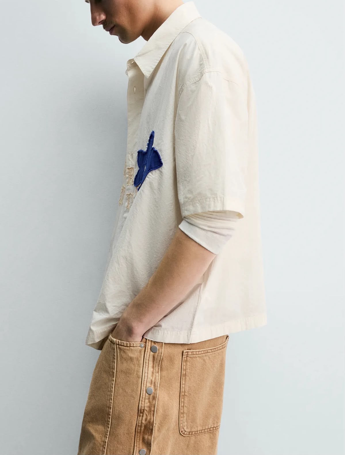 Cream Statement Shirt – Never Settle Embroidered Detail