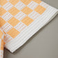 Louis Vuitton Orange & White Checkered Polo Shirt – Textured Knit Design